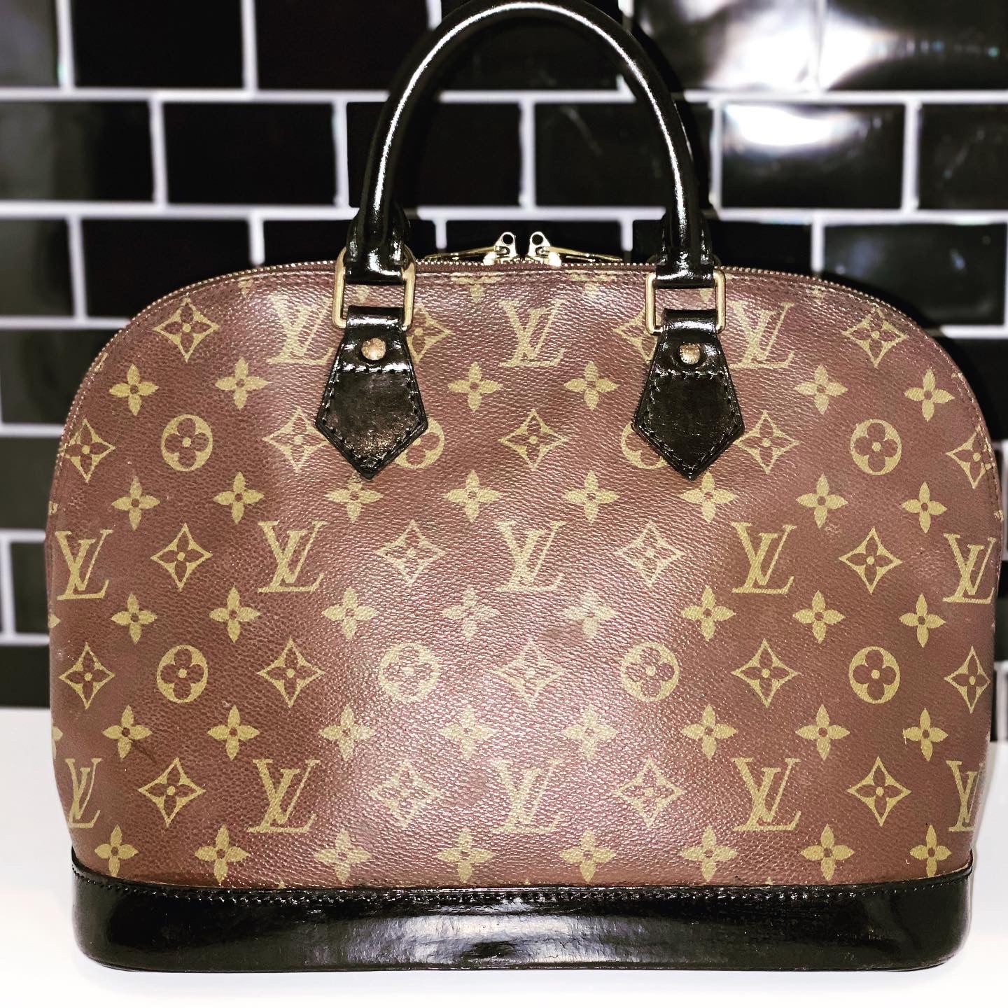 Shop Louis Vuitton ALMA black